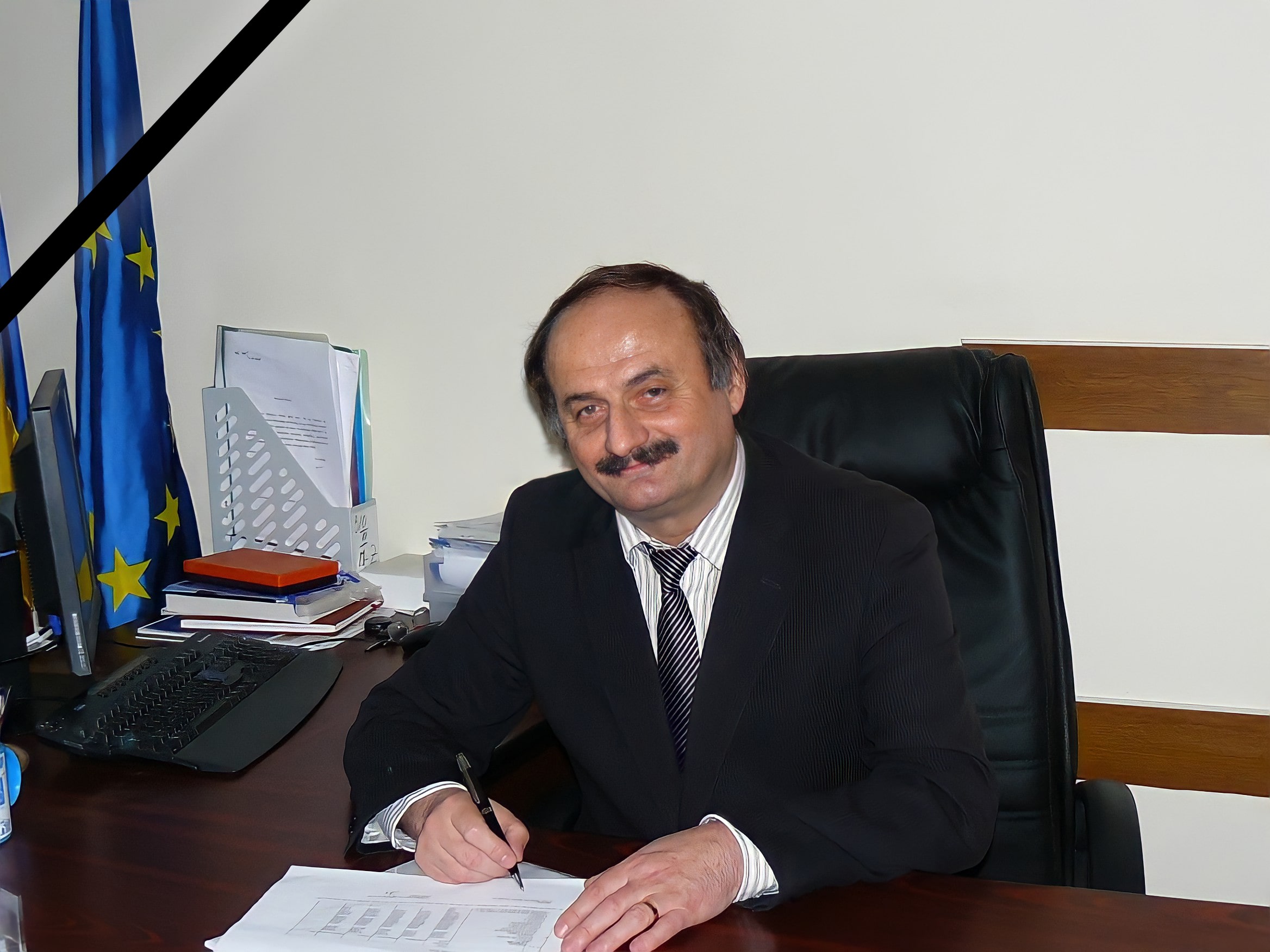 Prof.univ.dr. Mihai TALMACIU min